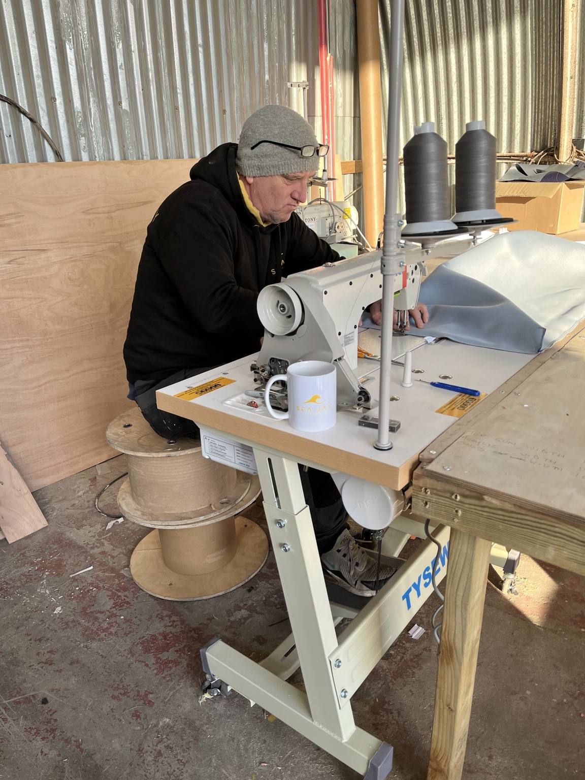 Cjay sewing one of Sea Jay Marine Services' first jobs in the original Griffiths Crossing workshop